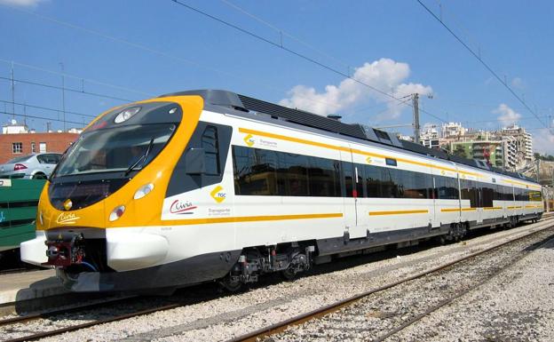 Recreación del ferrocarril de Gran Canaria circulando por una vía férrea. 