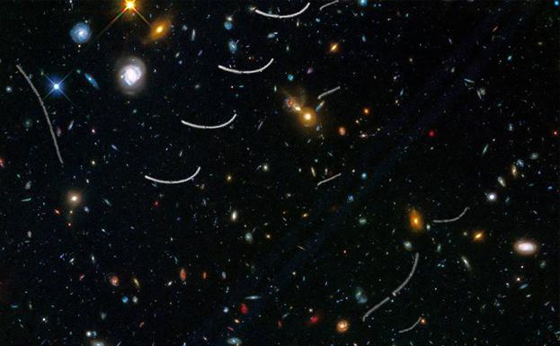 Asteroids captured as streaks in an image taken by the Hubble Space Telescope.