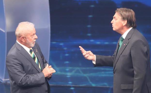 Lula y Bolsonaro, durante el cara a cara./ep